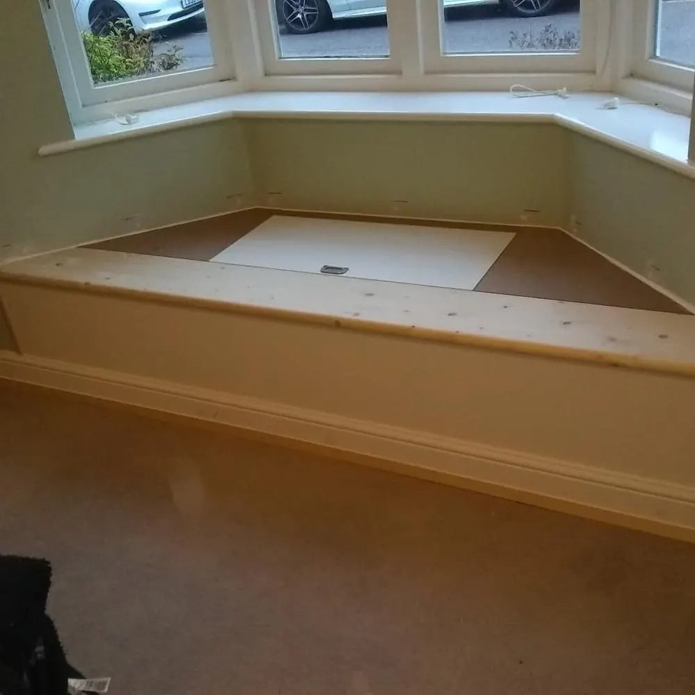Bay window storage seat during construction